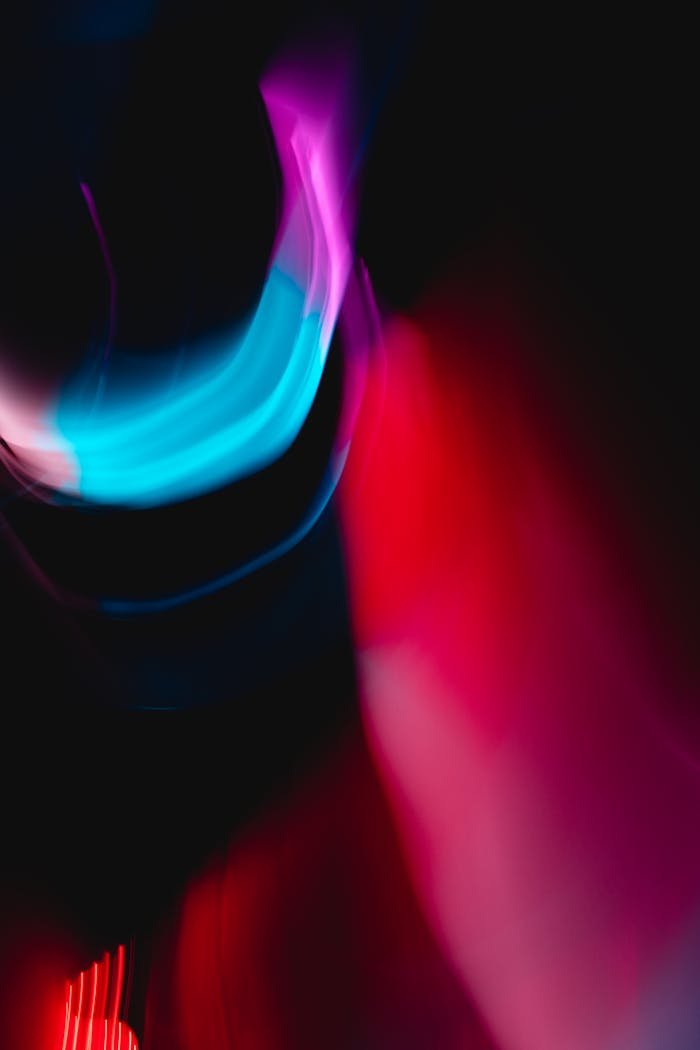 Vibrant abstract image of colorful light streaks creating a dynamic, futuristic effect.